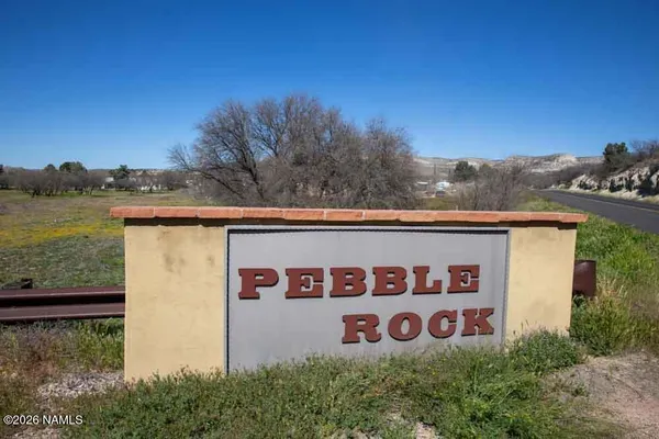 a sign that is on the side of the road