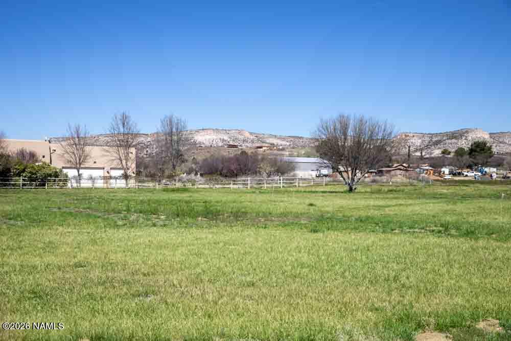 1097 Amber Way Camp Verde, AZ 86322 - Photo 5 of 22 a view of a field of grass and trees