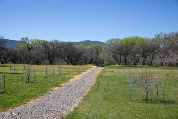 a view of a golf course with a lake