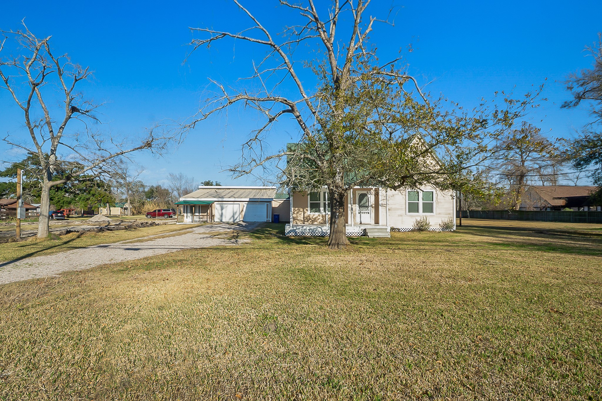 109 Maple Street Highlands, TX 77562 - Photo 6 of 50 a view of a house with a yard