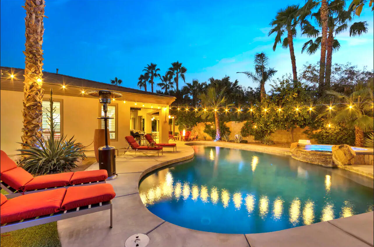 48713 Spring Rain Court Indio, CA 92201 - Photo 12 of 66 a view of a swimming pool with a patio