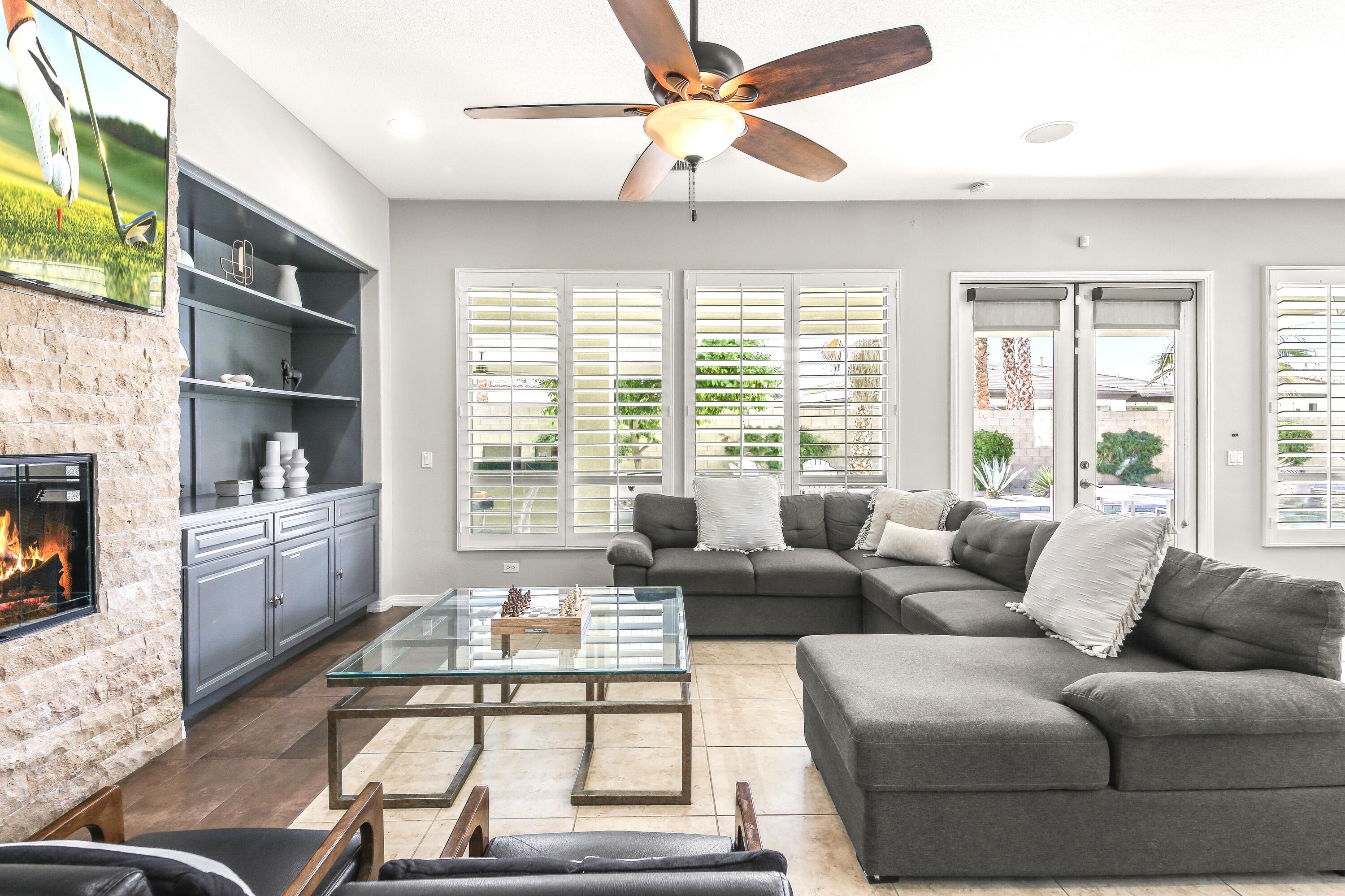 48713 Spring Rain Court Indio, CA 92201 - Photo 20 of 66 a living room with furniture and a large window