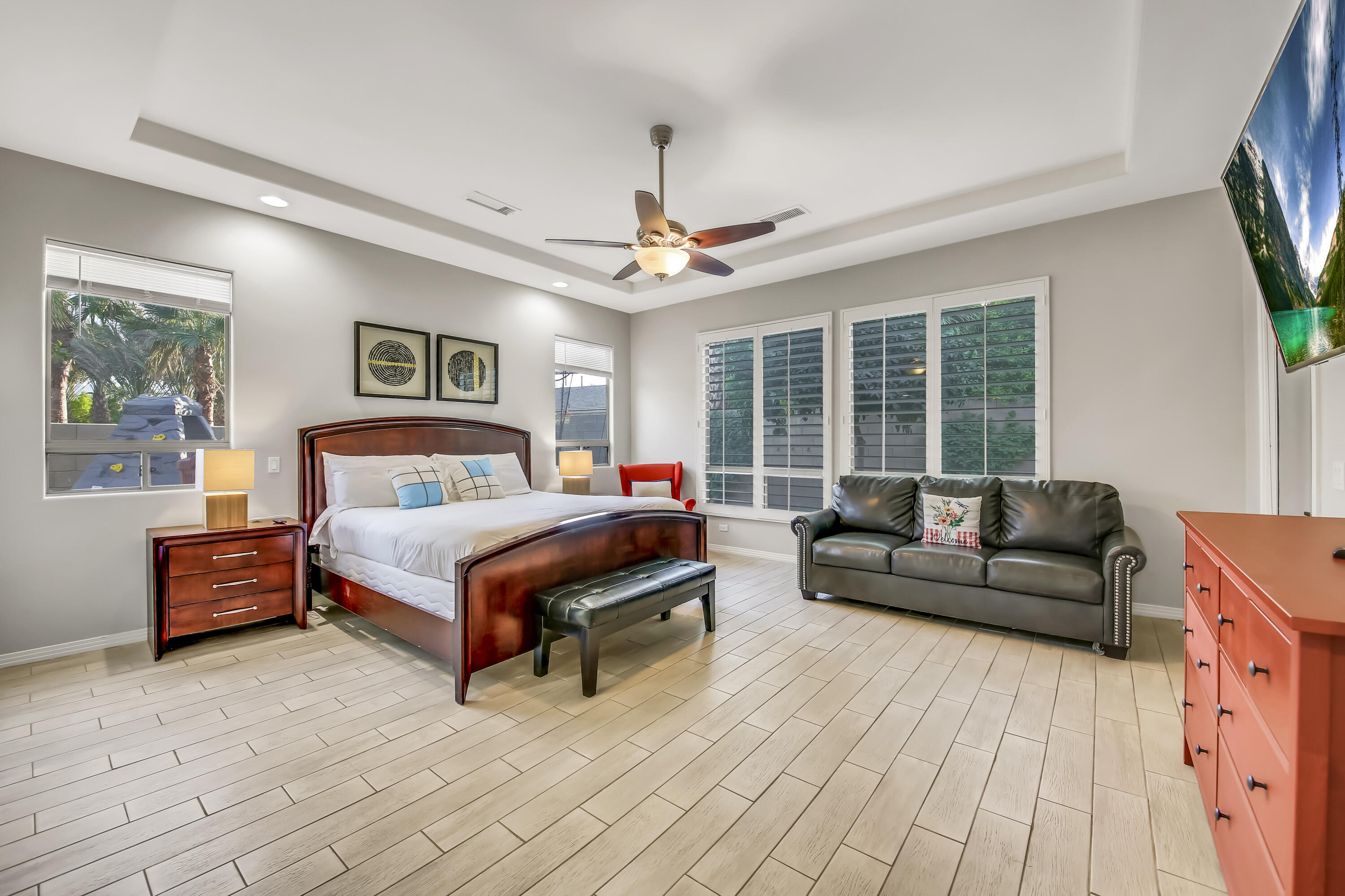 48713 Spring Rain Court Indio, CA 92201 - Photo 33 of 66 a bedroom with a bed couch and a window