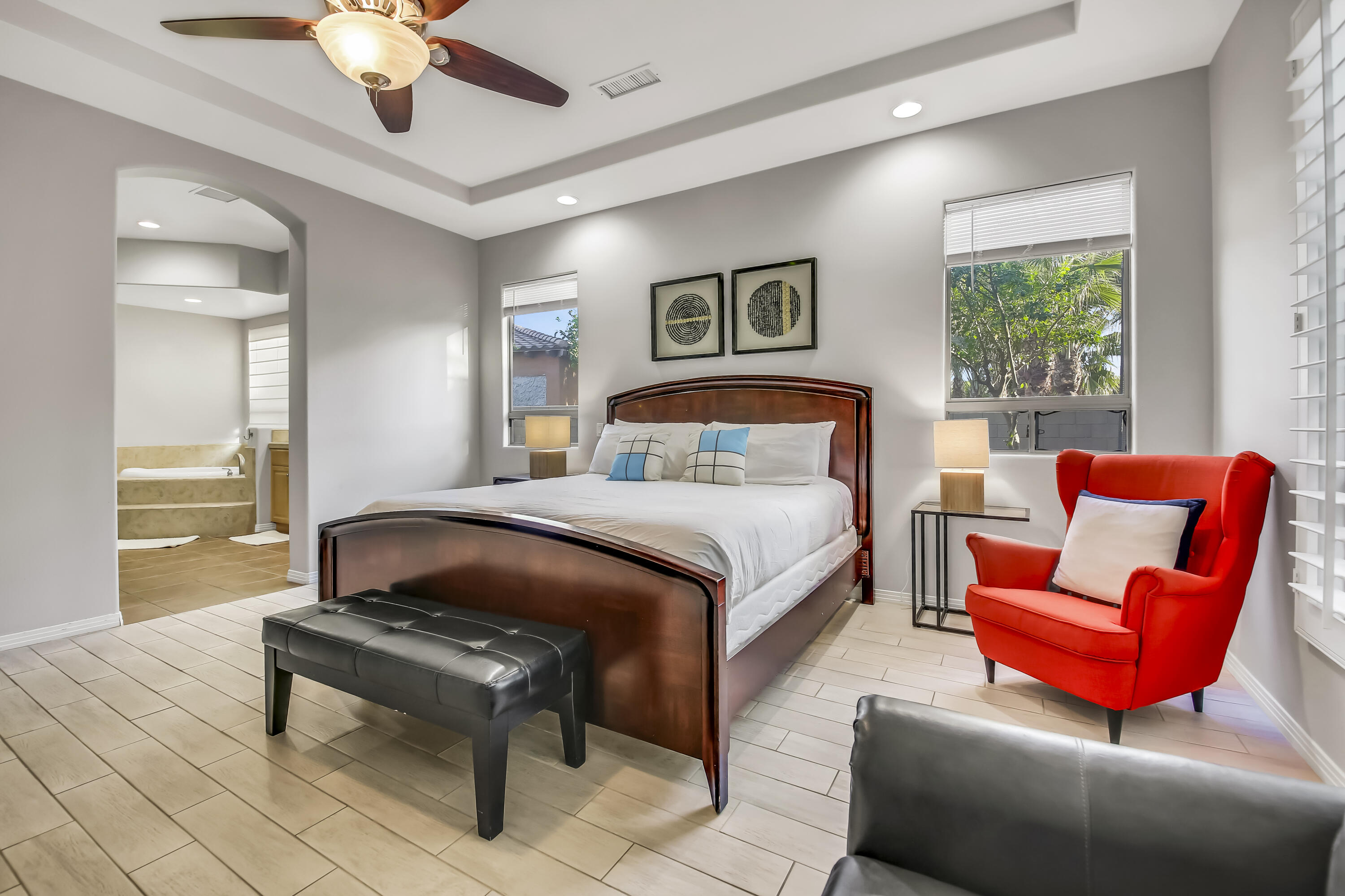 48713 Spring Rain Court Indio, CA 92201 - Photo 34 of 66 a bedroom with furniture and a large window