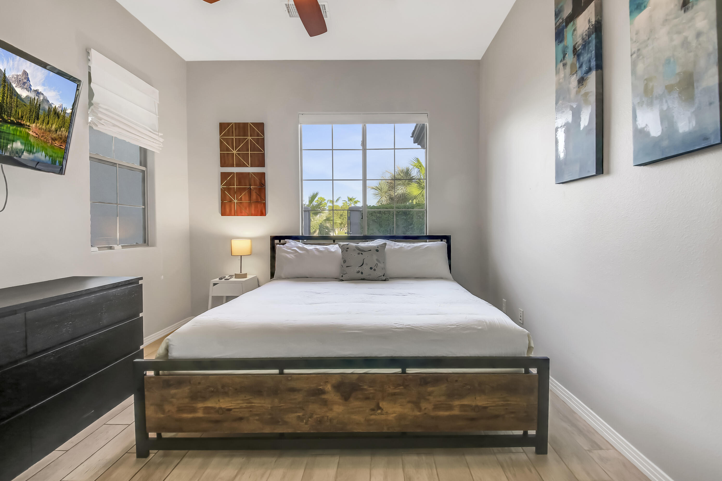 48713 Spring Rain Court Indio, CA 92201 - Photo 43 of 66 a bedroom with a bed and a window