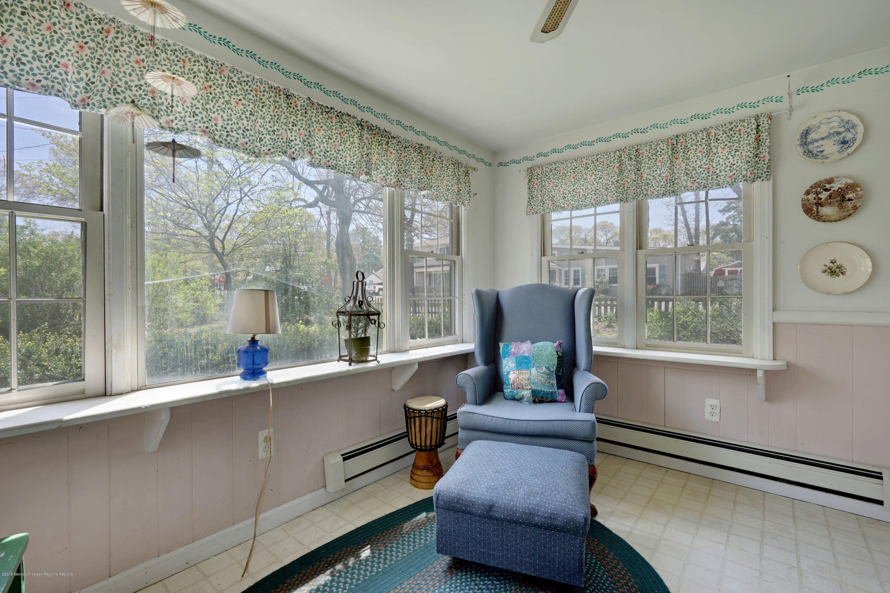 100 Breton Road Brick, NJ 08723 - Photo 12 of 37 a living room with furniture and a large window