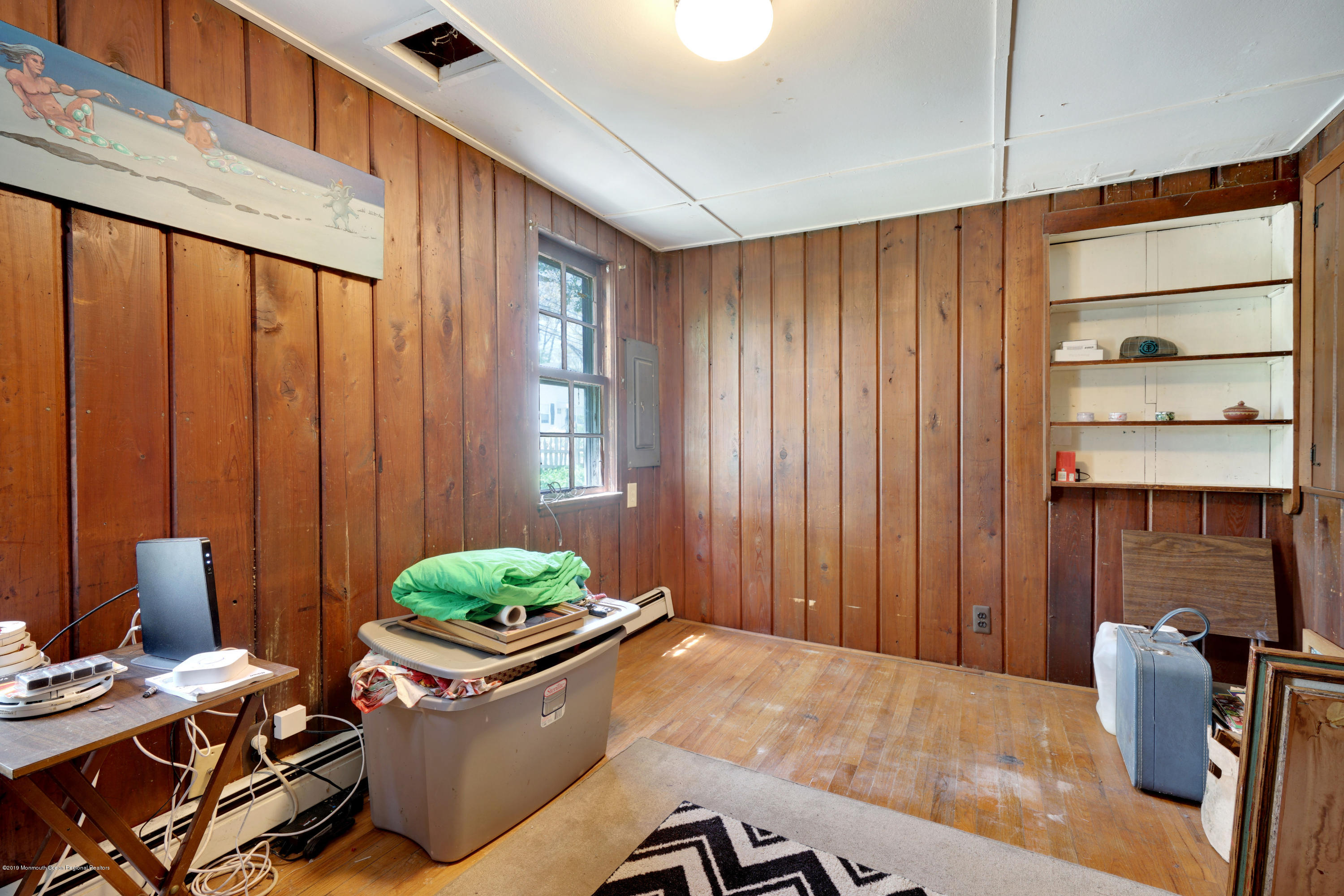 100 Breton Road Brick, NJ 08723 - Photo 14 of 37 a living room with furniture and a window
