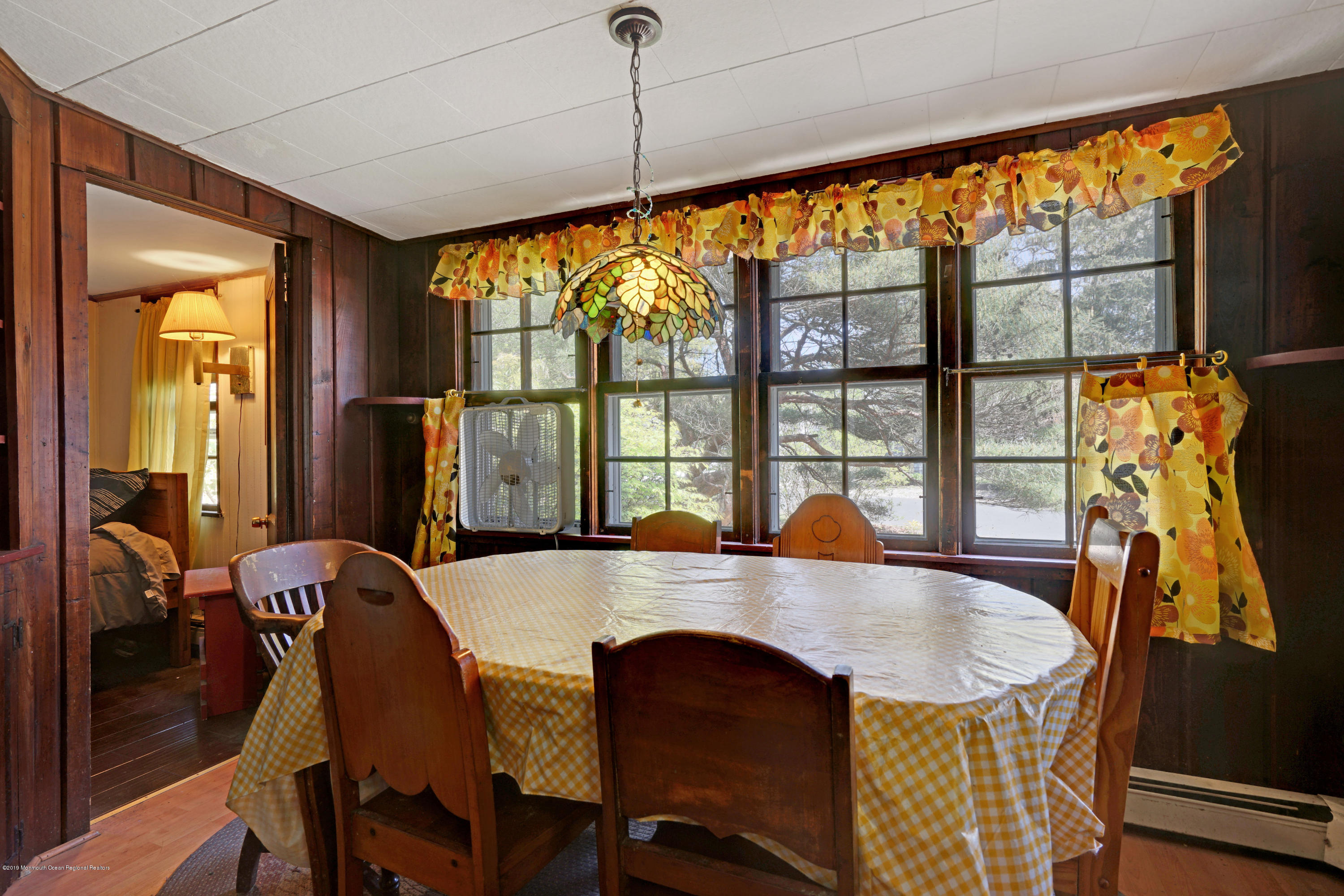 100 Breton Road Brick, NJ 08723 - Photo 17 of 37 a large dining room with a table and chairs