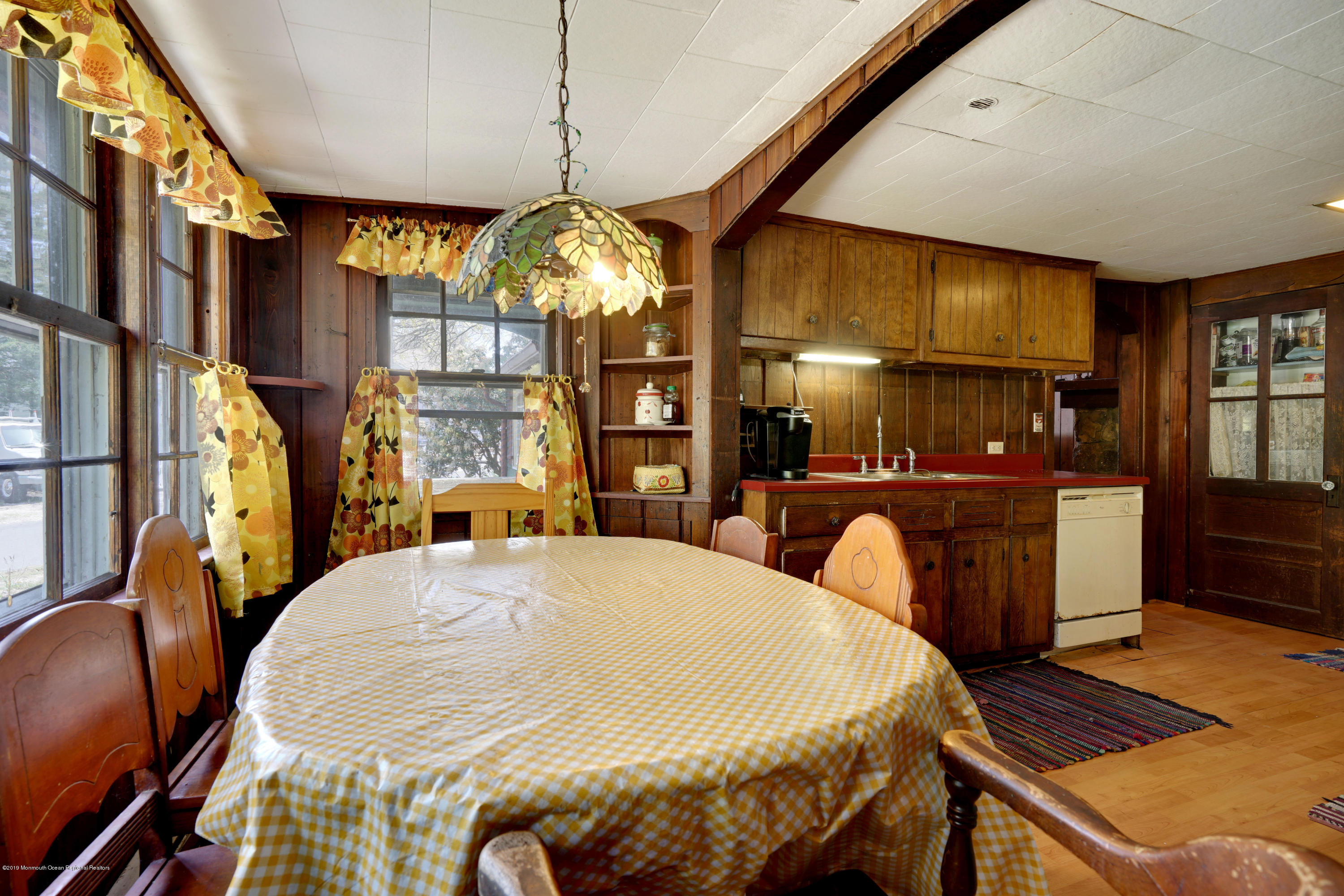 100 Breton Road Brick, NJ 08723 - Photo 20 of 37 a large kitchen with a table and chairs