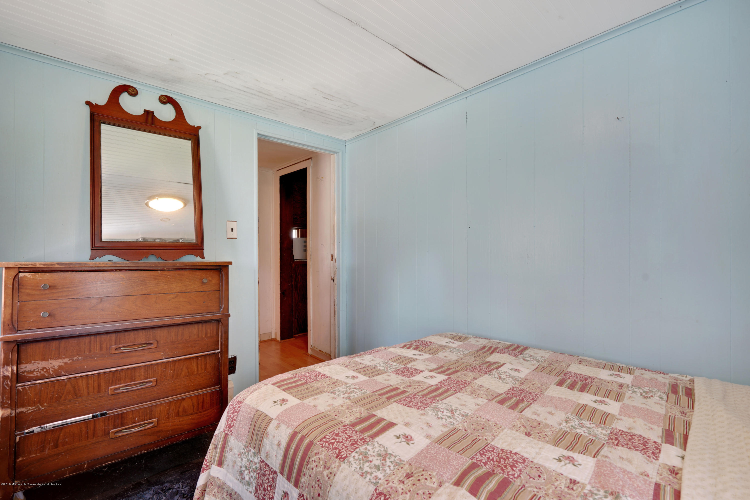 100 Breton Road Brick, NJ 08723 - Photo 25 of 37 a bedroom with a bed and a dresser