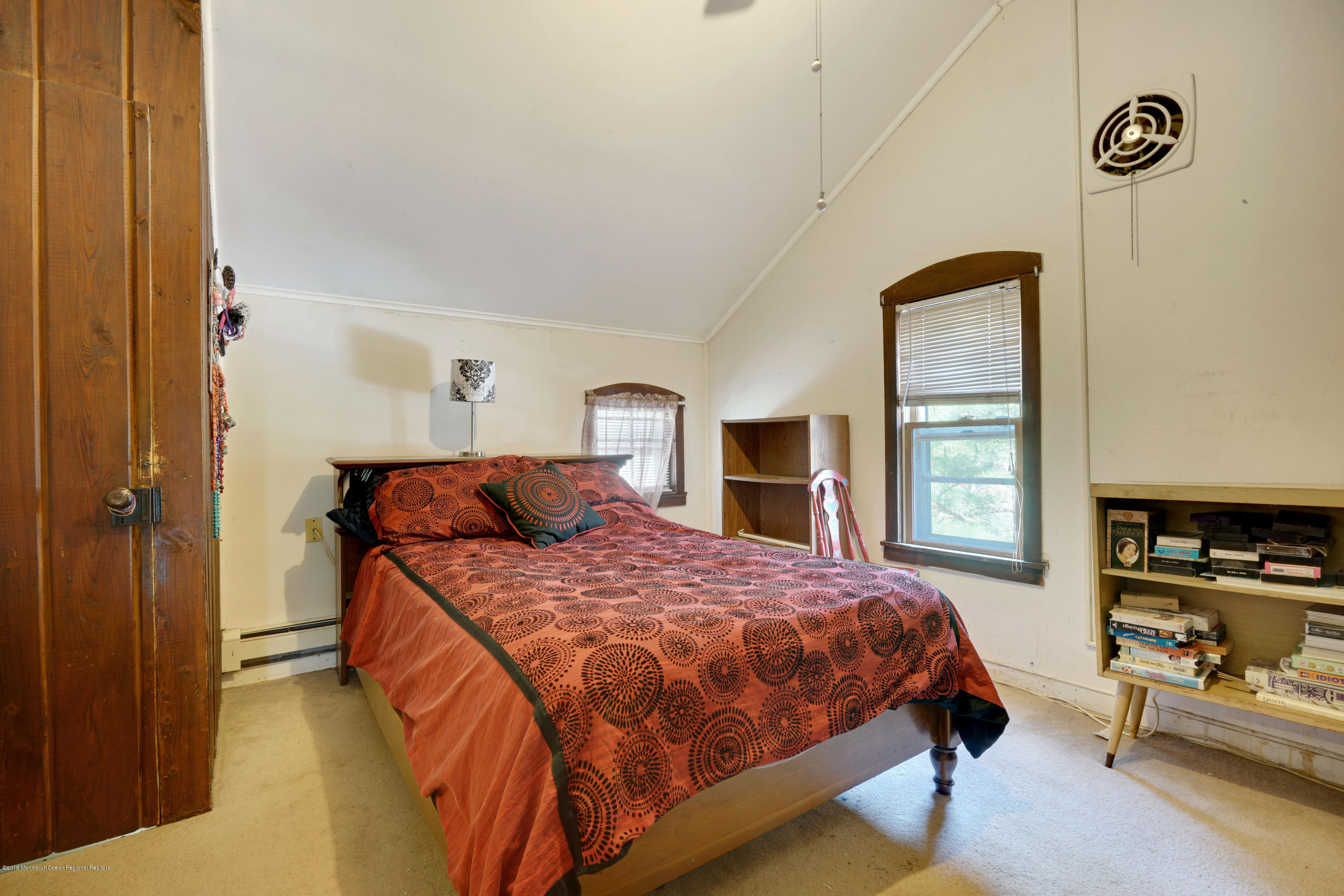 100 Breton Road Brick, NJ 08723 - Photo 31 of 37 a bedroom with a bed and wooden floor