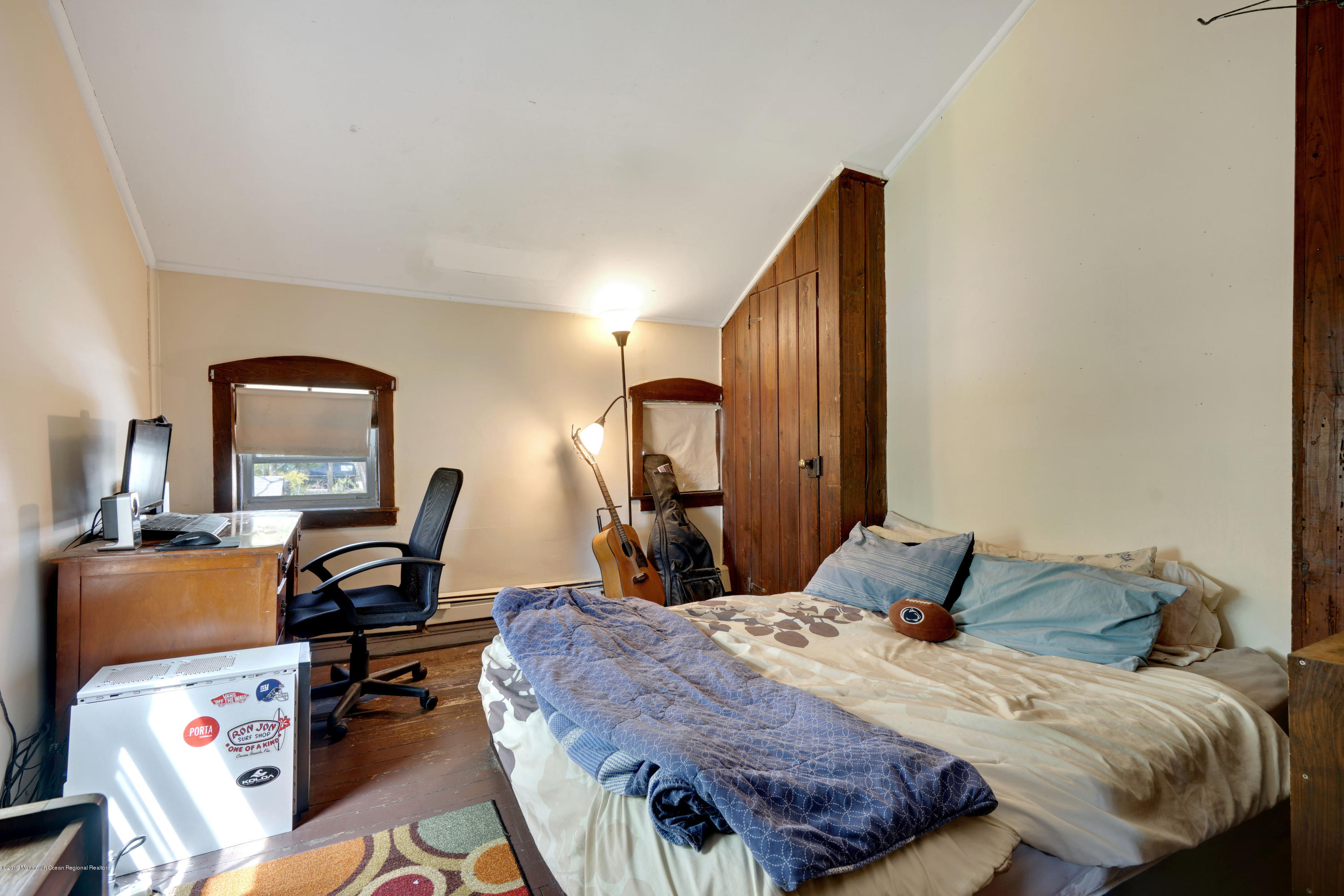 100 Breton Road Brick, NJ 08723 - Photo 32 of 37 a bedroom with a bed and a desk