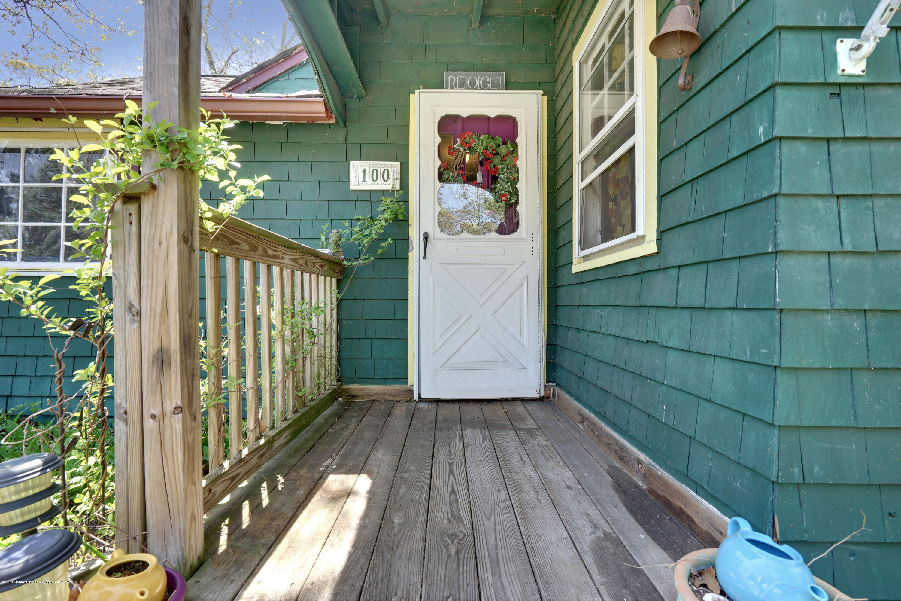 100 Breton Road Brick, NJ 08723 - Photo 5 of 37 a view of a house with a wooden floor and a potted plant