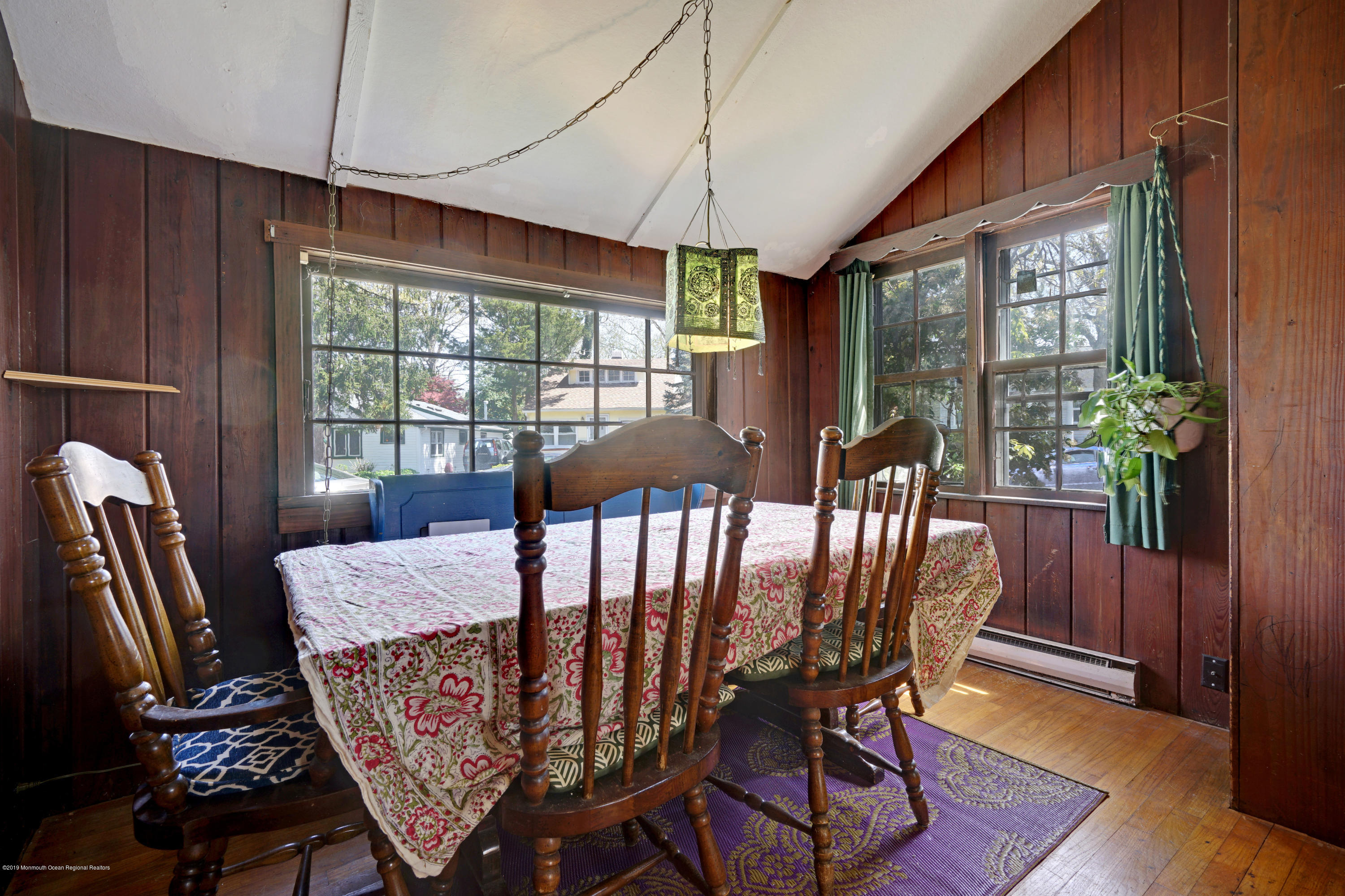100 Breton Road Brick, NJ 08723 - Photo 9 of 37 a view of a dining room with furniture window and wooden floor