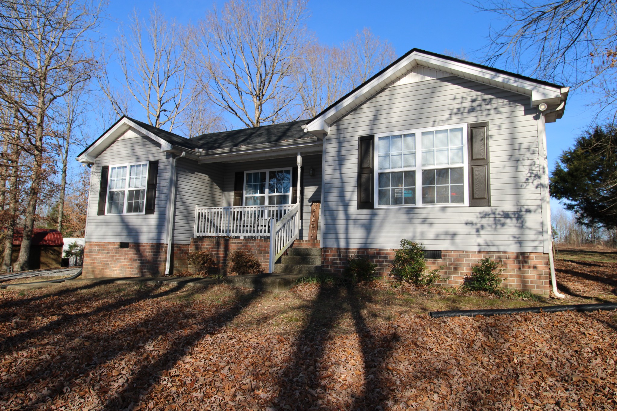 142 Keytown Road Portland, TN 37148 - Photo 46 of 46 a front view of a house with a yard
