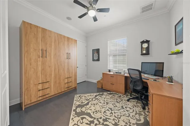 a workspace with furniture and window