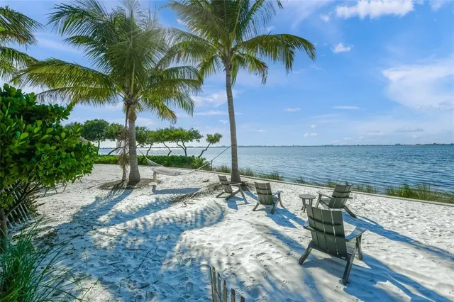 a view of a lake with a sitting area