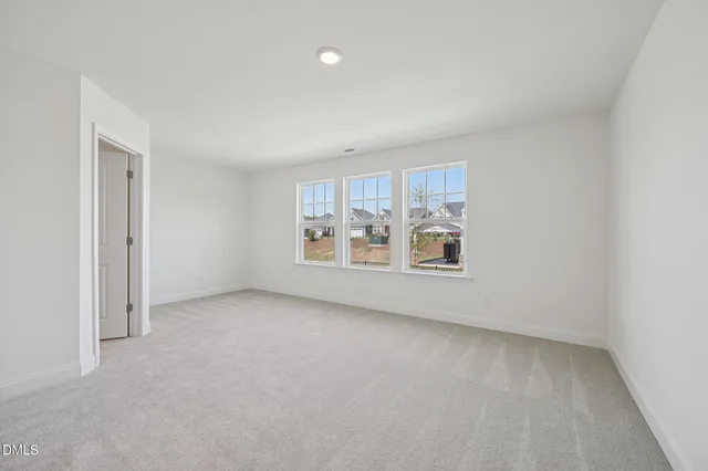 a bathroom with a toilet and a bathtub