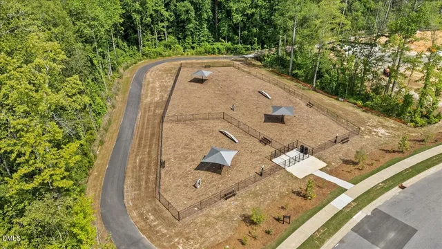 a view of balcony with wooden floor and fence