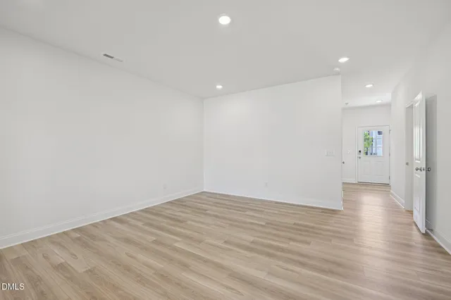 a kitchen that has a sink and a stove