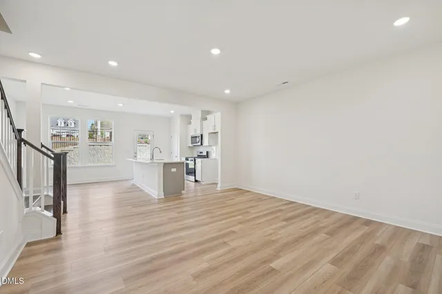 a view of room with window and lounge chair