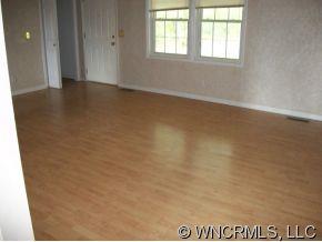 995 Painters Gap Road Rutherfordton, NC 28139 - Photo 2 of 5 an empty room with windows