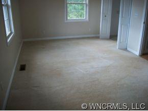 995 Painters Gap Road Rutherfordton, NC 28139 - Photo 5 of 5 an empty room with windows