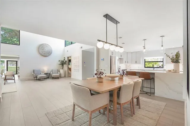 a view of a kitchen and dining room