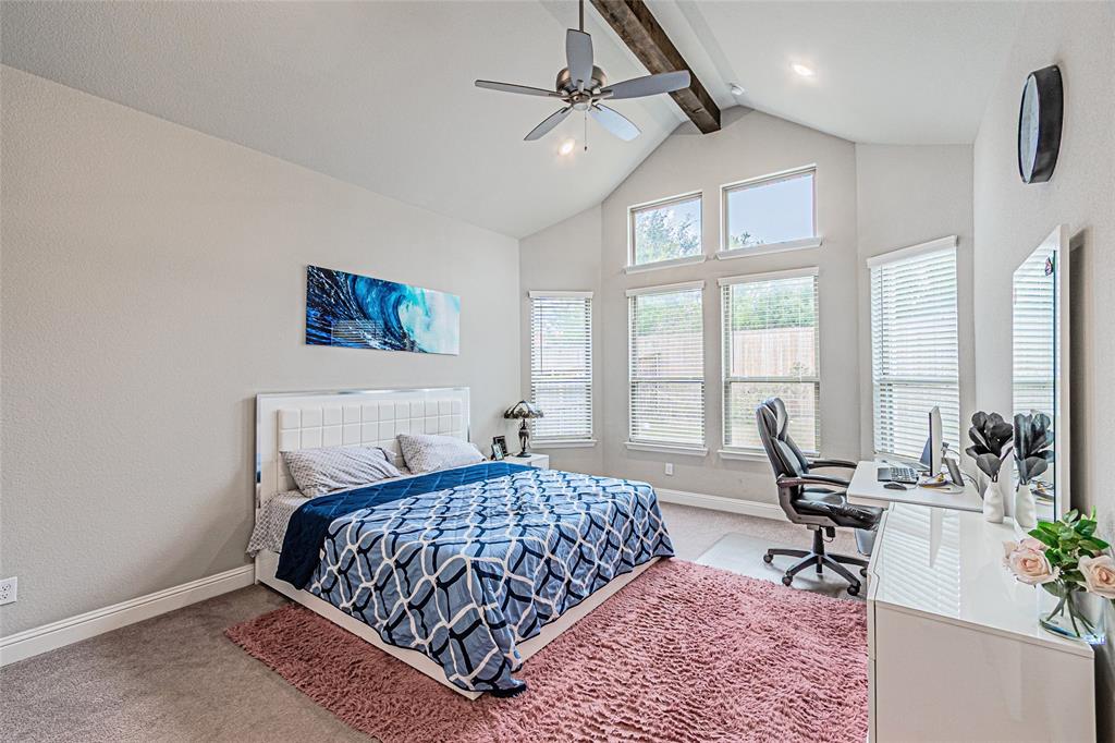 13261 Jonata Street Frisco, TX 75035 - Photo 19 of 40 a bedroom with a bed and large windows