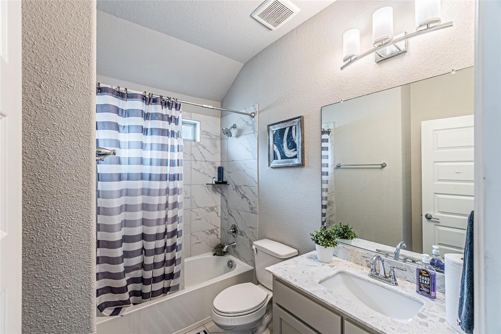 13261 Jonata Street Frisco, TX 75035 - Photo 26 of 40 a bathroom with a sink a toilet and shower