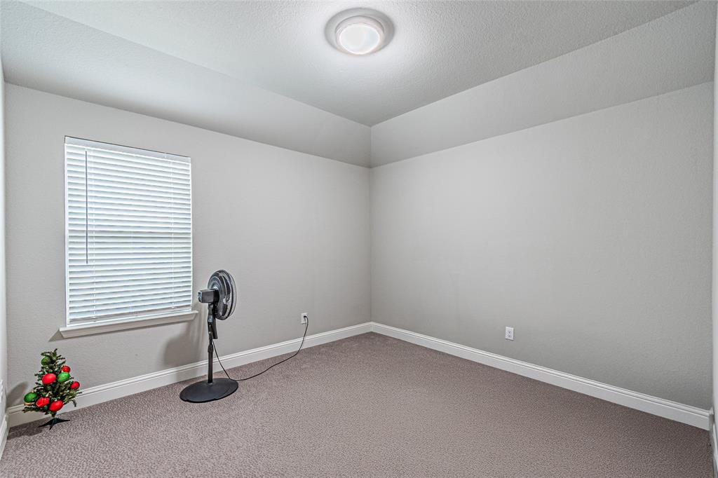 13261 Jonata Street Frisco, TX 75035 - Photo 34 of 40 an empty room with a window