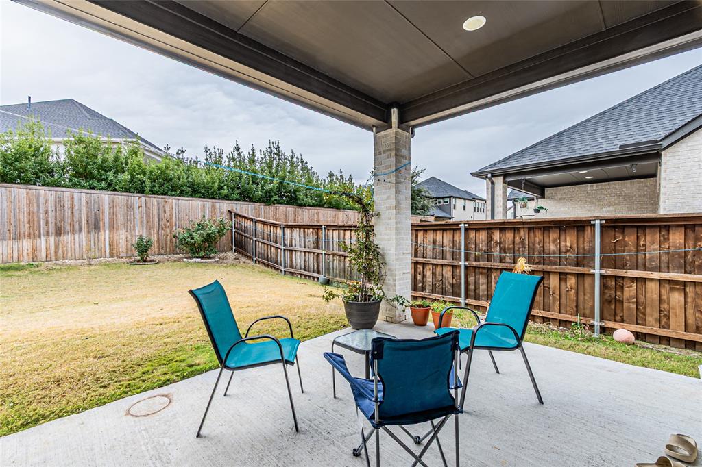 13261 Jonata Street Frisco, TX 75035 - Photo 36 of 40 a view of a chairs and table in patio