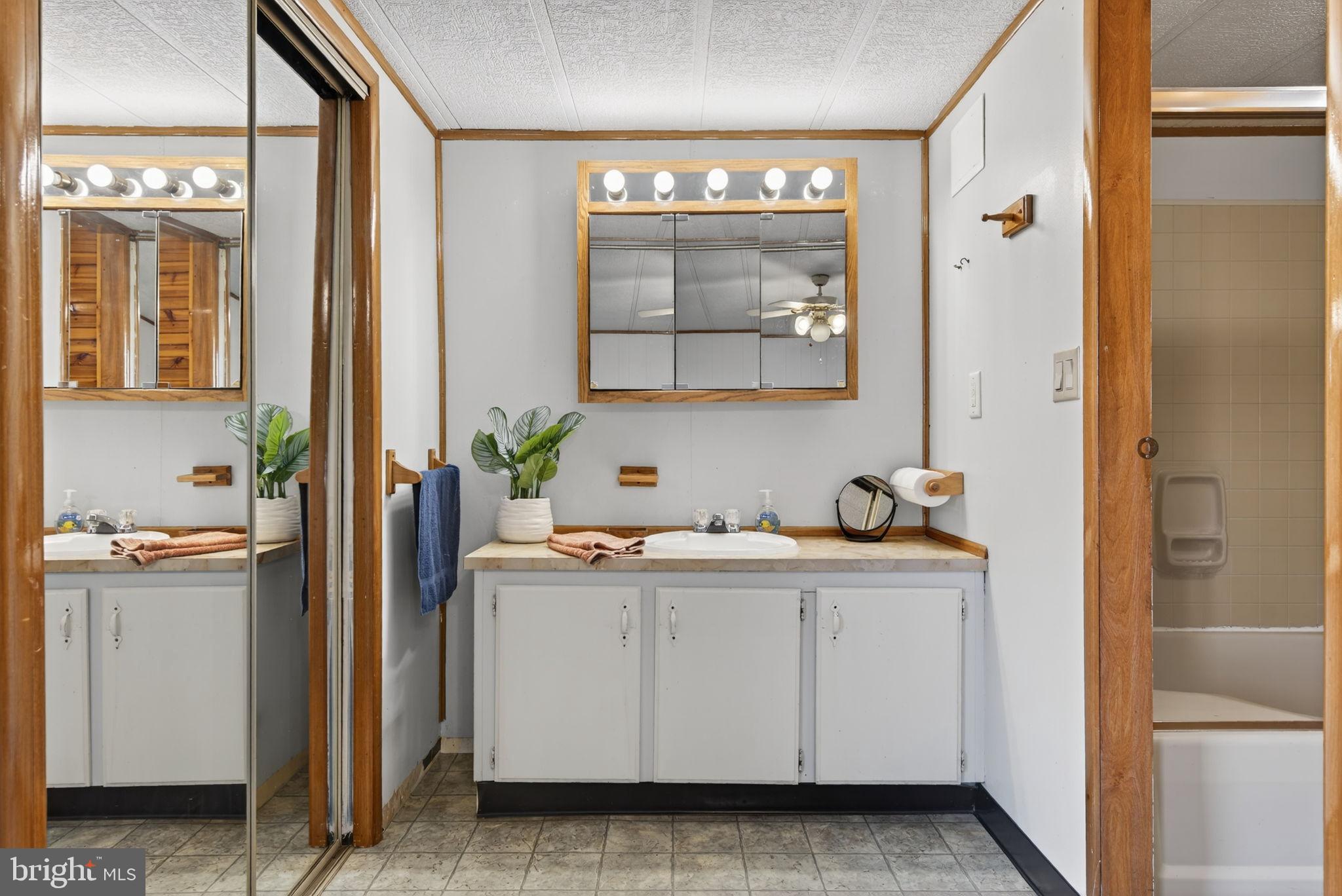 918 Krista Court Lancaster, PA 17601 - Photo 22 of 43 a view of cabinets a sink and a window in a room