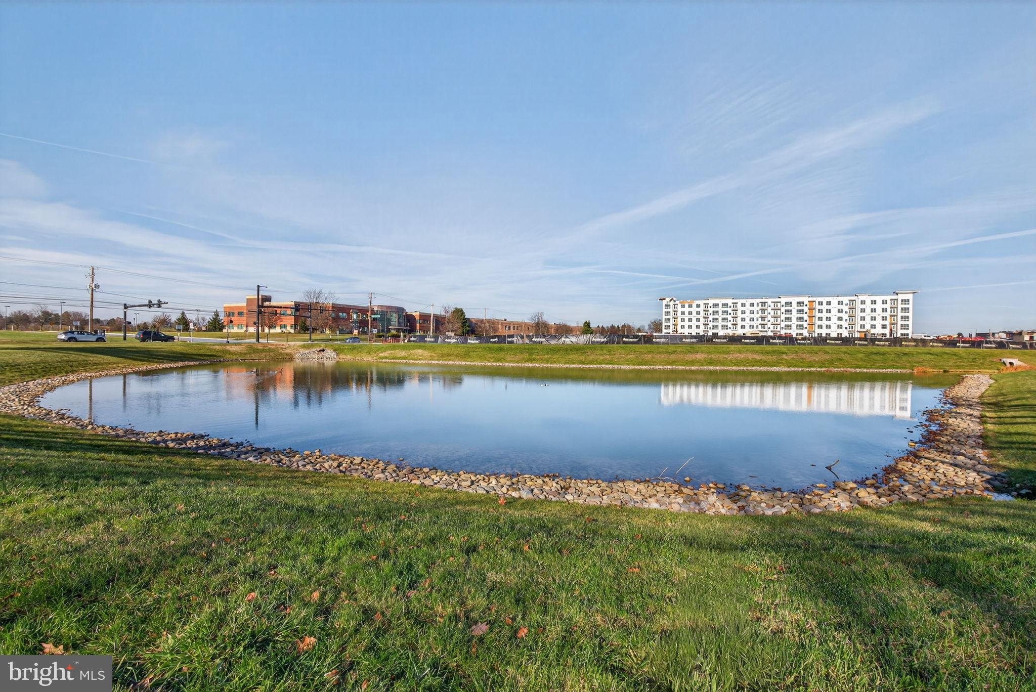 918 Krista Court Lancaster, PA 17601 - Photo 36 of 43 a view of a lake with houses in the back