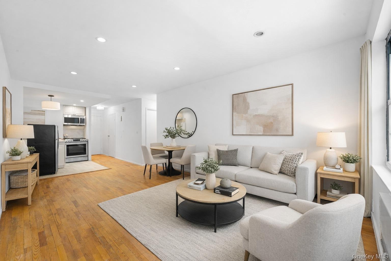 84-30 98th Street Queens, NY 11421 - Photo 23 of 35 a living room with furniture and a wooden floor