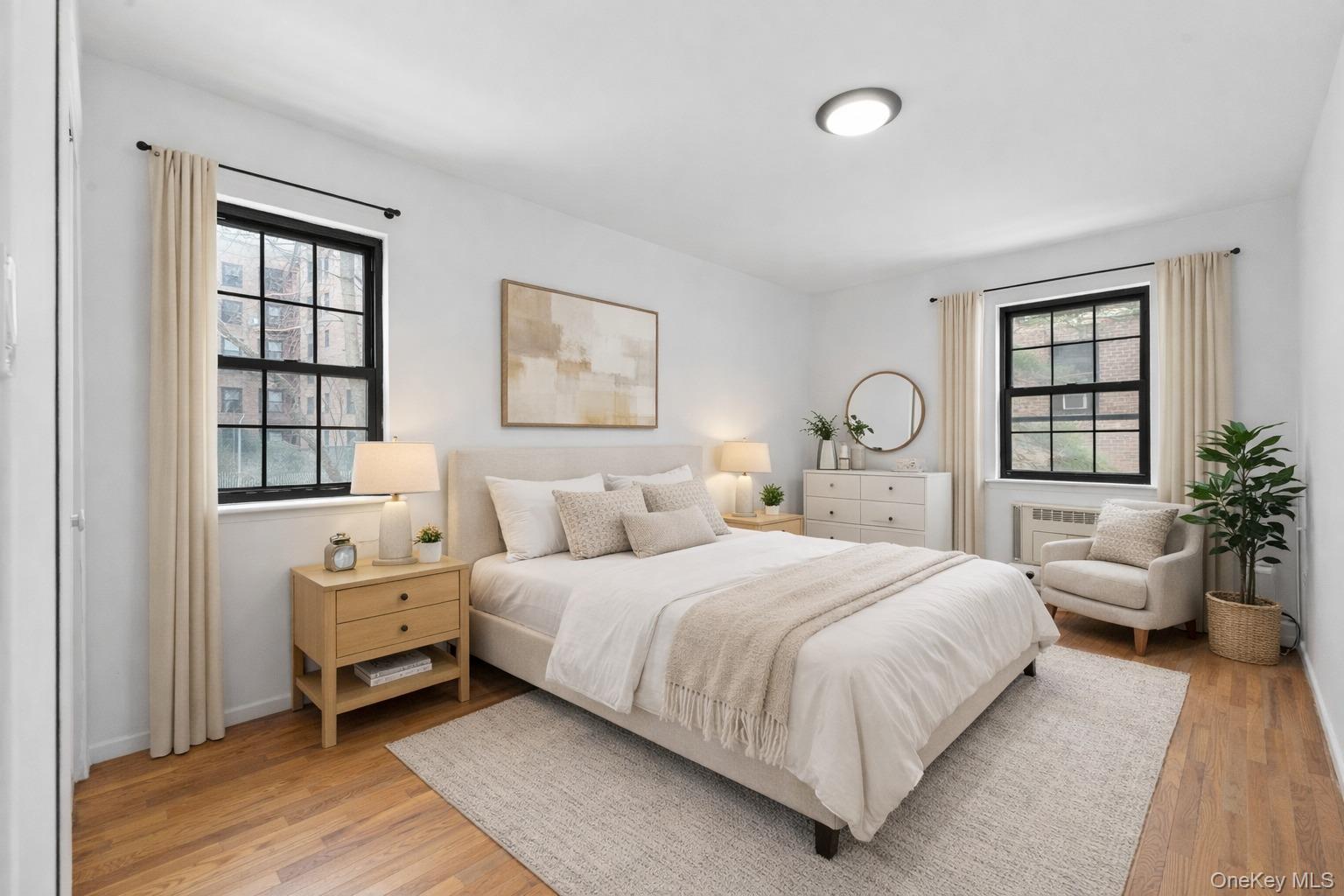 84-30 98th Street Queens, NY 11421 - Photo 27 of 35 a bedroom with a large bed and windows