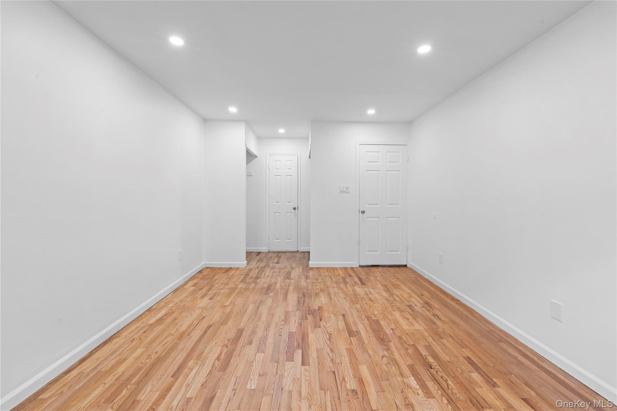 84-30 98th Street Queens, NY 11421 - Photo 30 of 35 a view of empty room with wooden floor