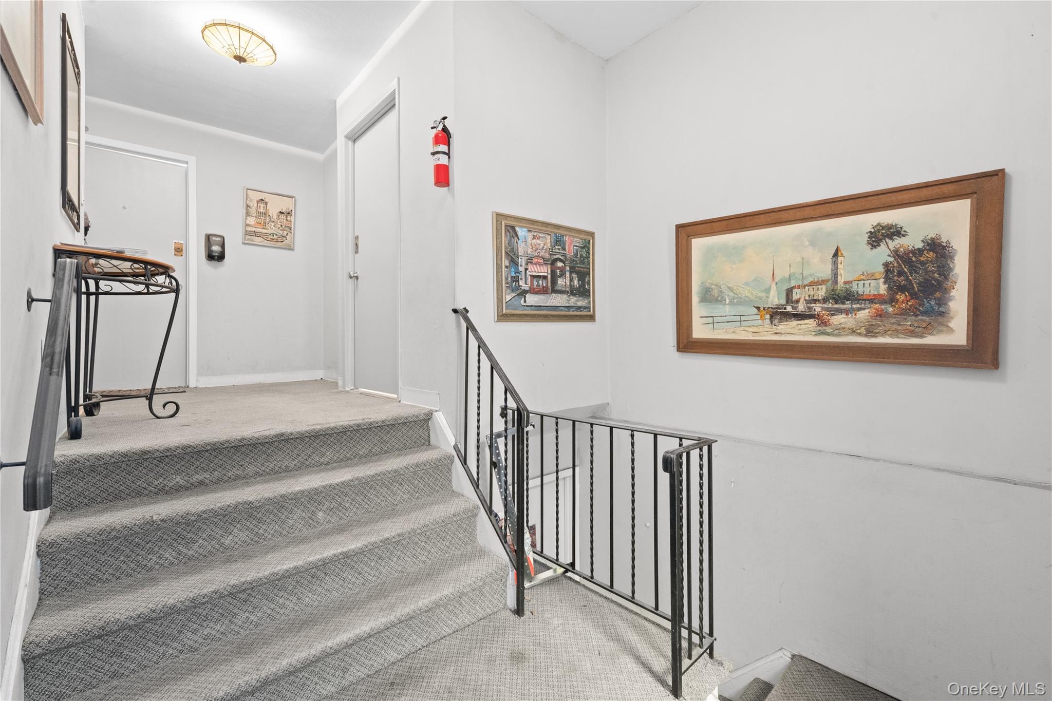 84-30 98th Street Queens, NY 11421 - Photo 33 of 35 a view of a hallway with staircase