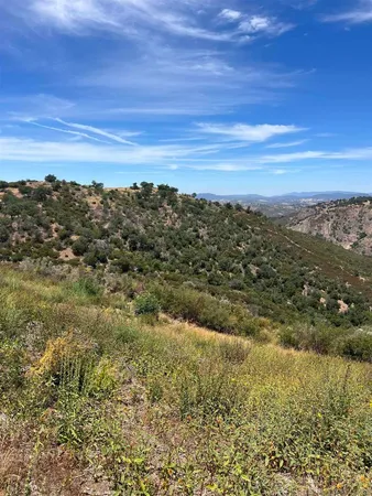 a view of lake and mountain