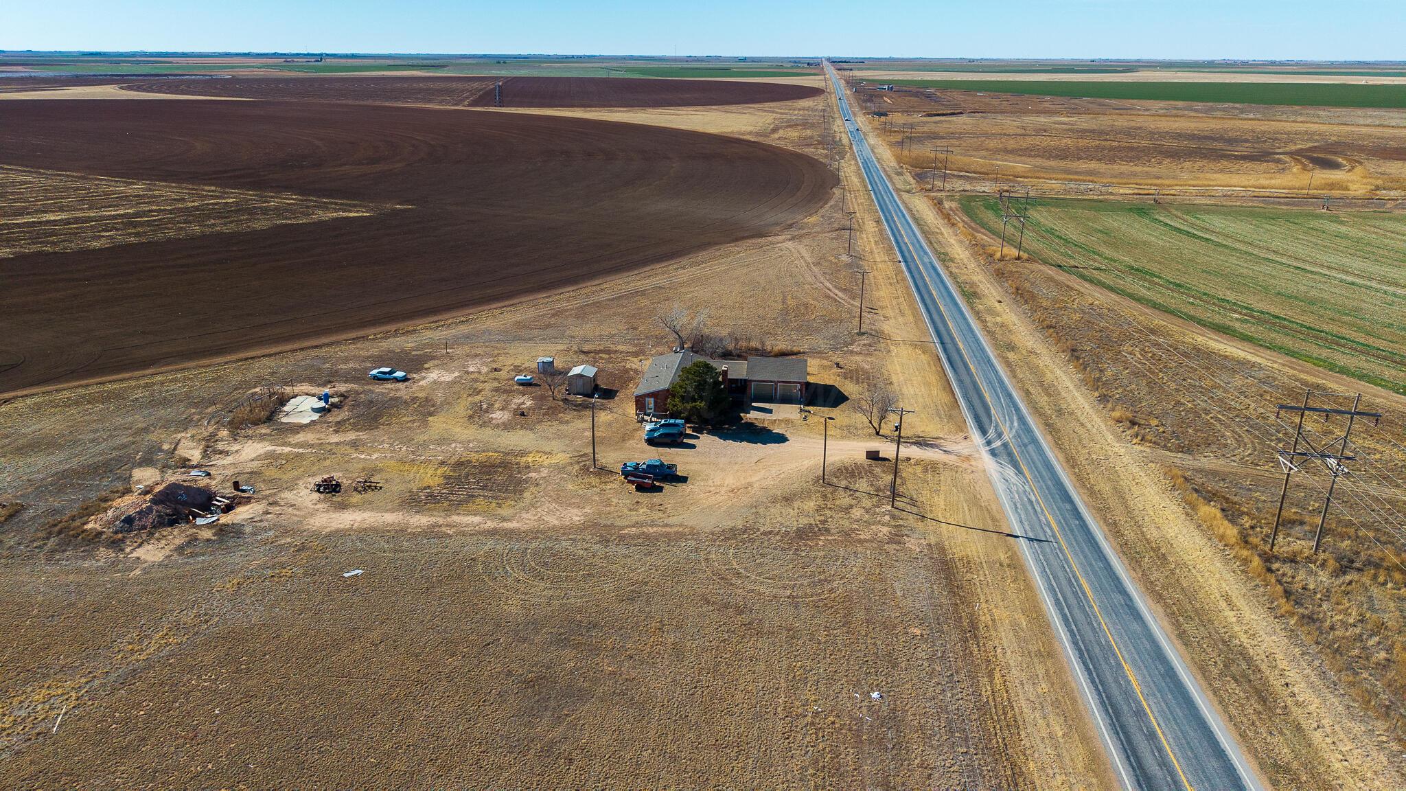 1790 Farm To Market Road 145 Hart, TX 79043 - Photo 25 of 28 a view of water heater room