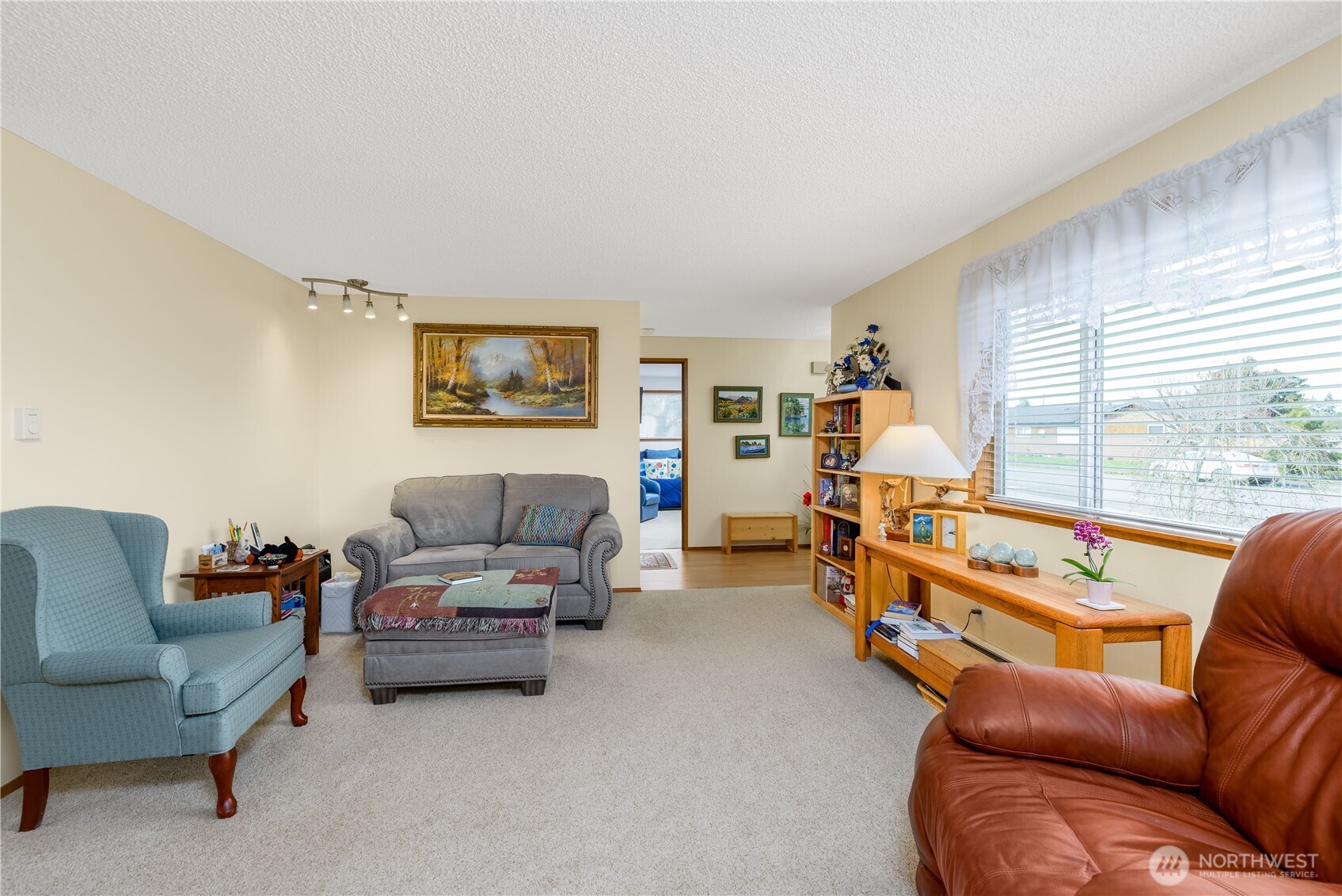 343 West Hemlock Street Sequim, WA 98382 - Photo 5 of 16 a living room with furniture and a large window
