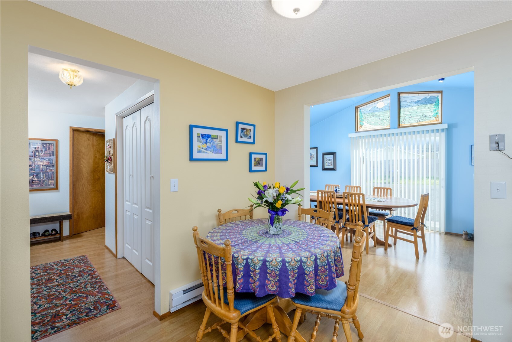 343 West Hemlock Street Sequim, WA 98382 - Photo 9 of 16 a view of a dining room with furniture and wooden floor