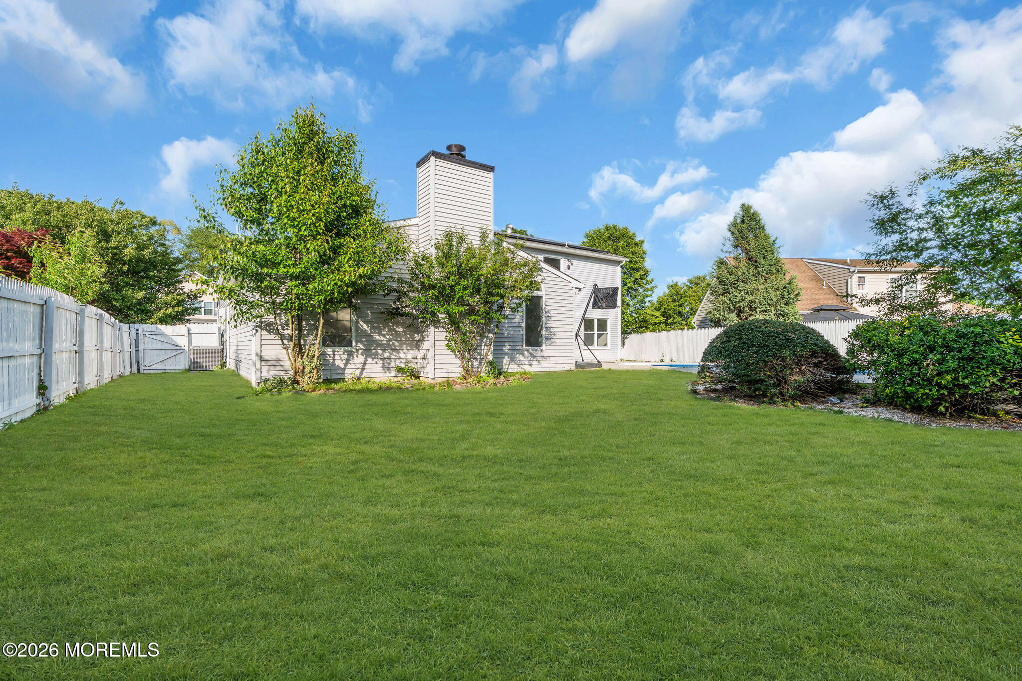45 Peachstone Road Howell, NJ 07731 - Photo 52 of 54 a front view of a house with a yard
