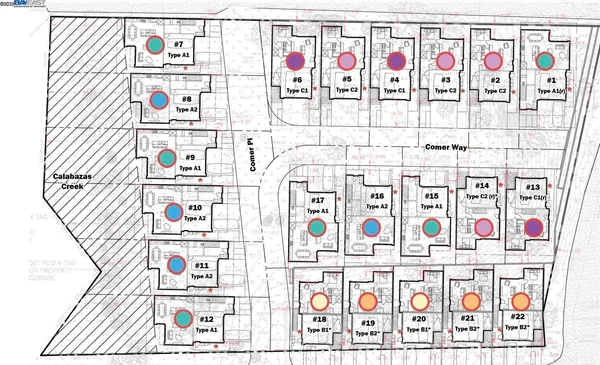 a signage on a wall with rack on the wall