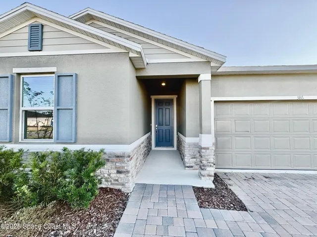 a view of a entryway door front of house
