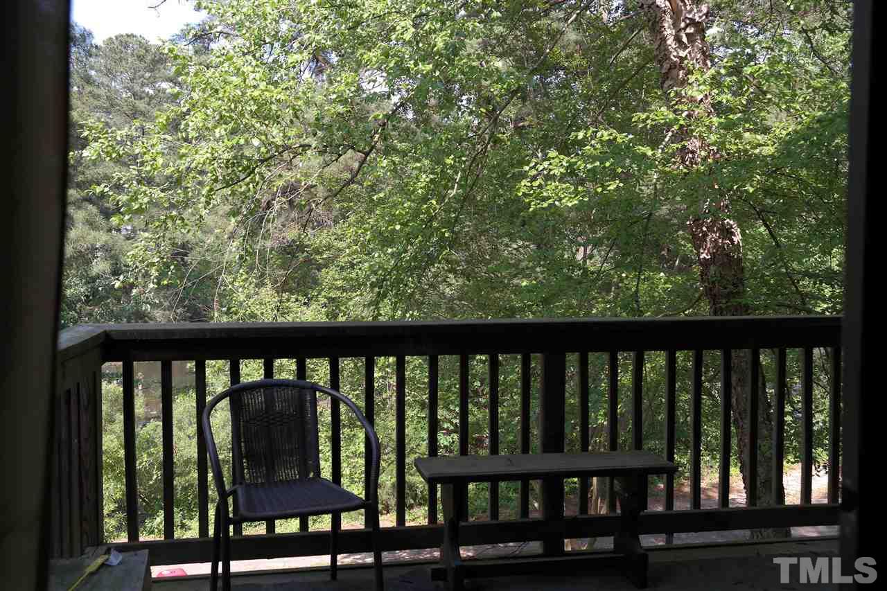 5108 Flint Ridge Place, Unit 5108 Raleigh, NC 27609 - Photo 15 of 15 a view of a balcony with chairs