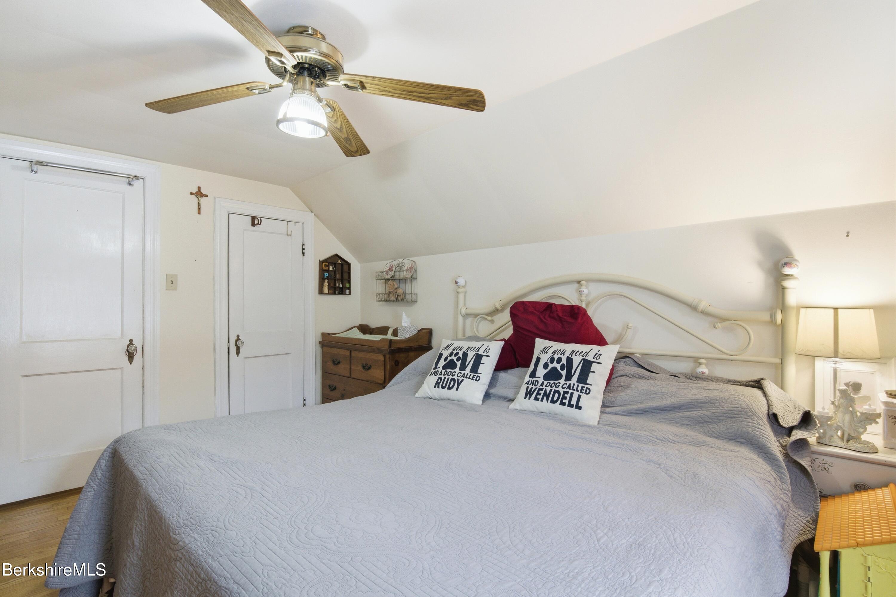 53 Edison Avenue Pittsfield, MA 01201 - Photo 25 of 45 a bedroom with a bed and a large mirror