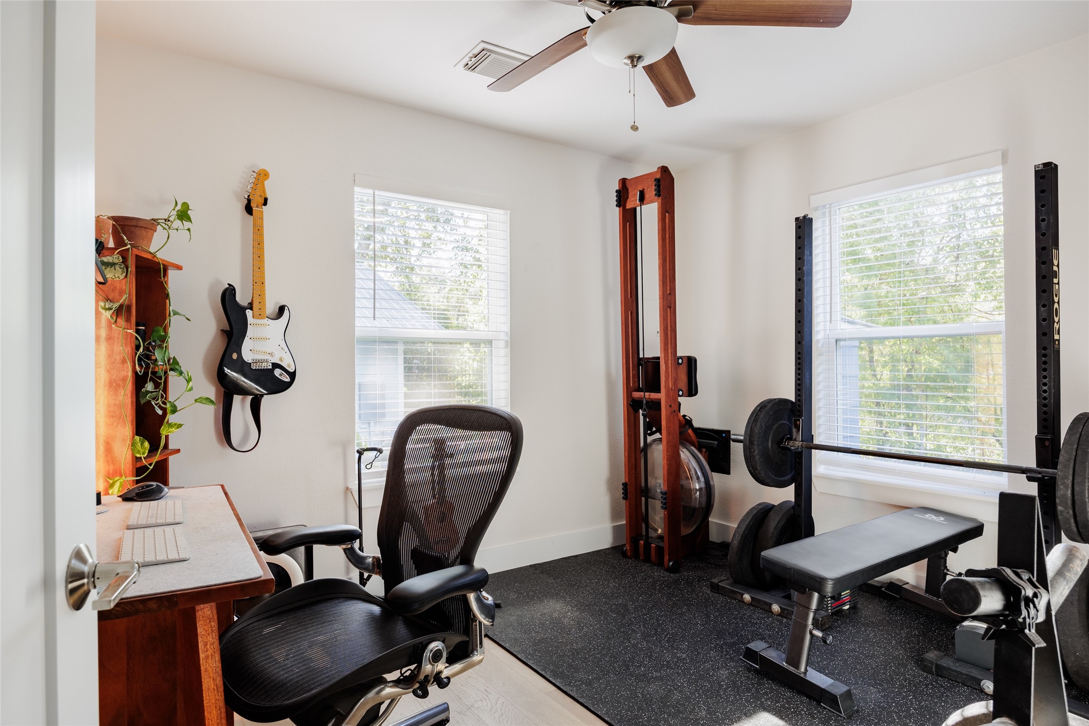 827 Gullett Street Austin, TX 78702 - Photo 11 of 25 a view of a workspace with furniture and a window