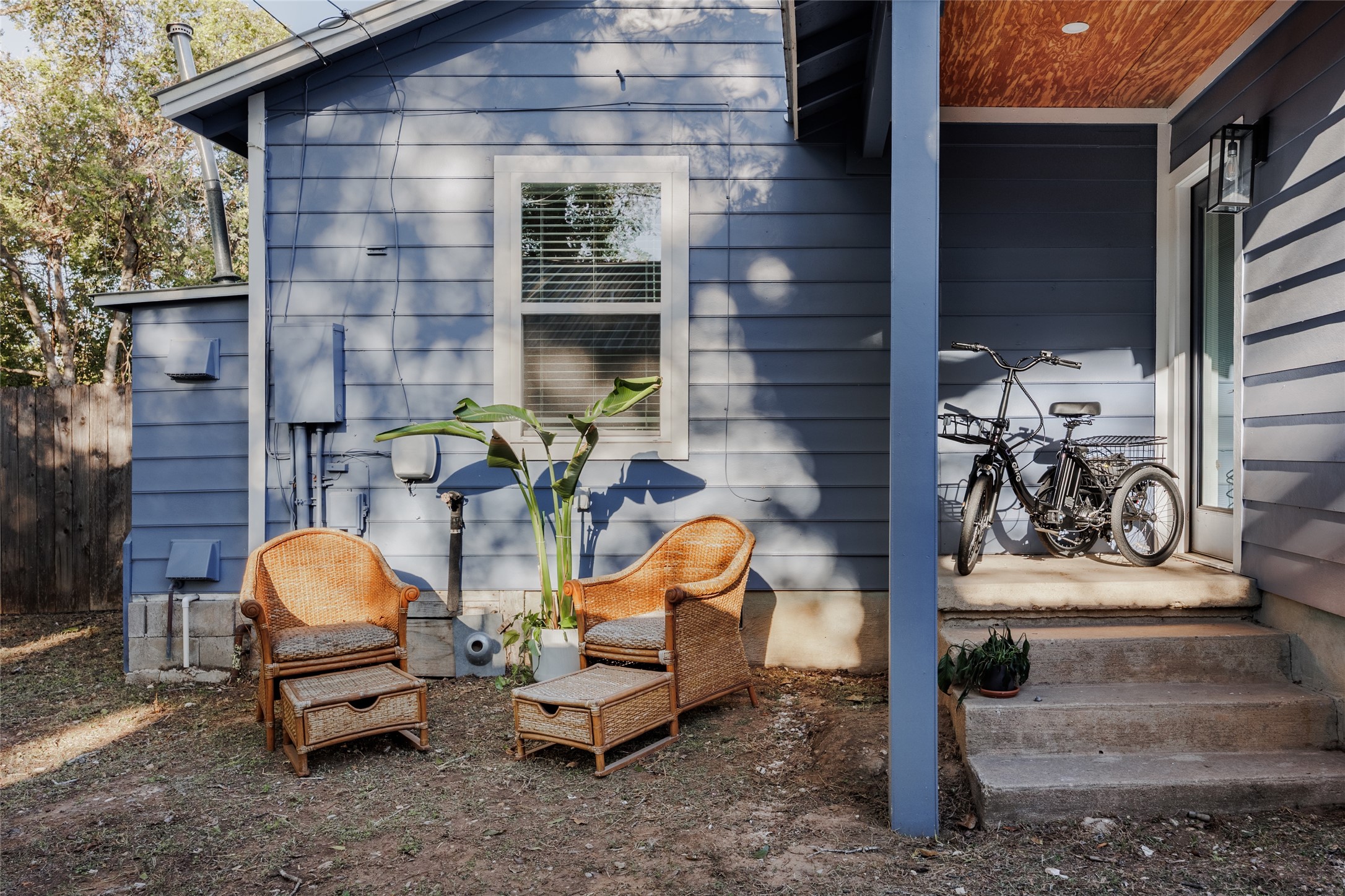 827 Gullett Street Austin, TX 78702 - Photo 13 of 25 a backyard of a house with outdoor seating