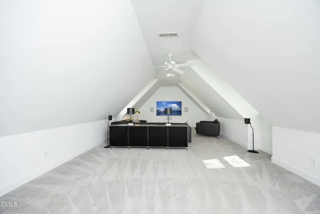 a balcony with couch and wooden floor